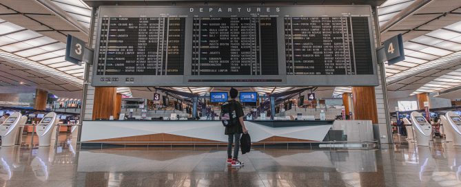 woman wearing black shirt and blue jeans